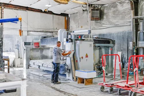 CNC stone cutting equipment inside the TNT fabrication shop
