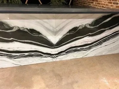 Bookmatched stone installation by TNT Countertops