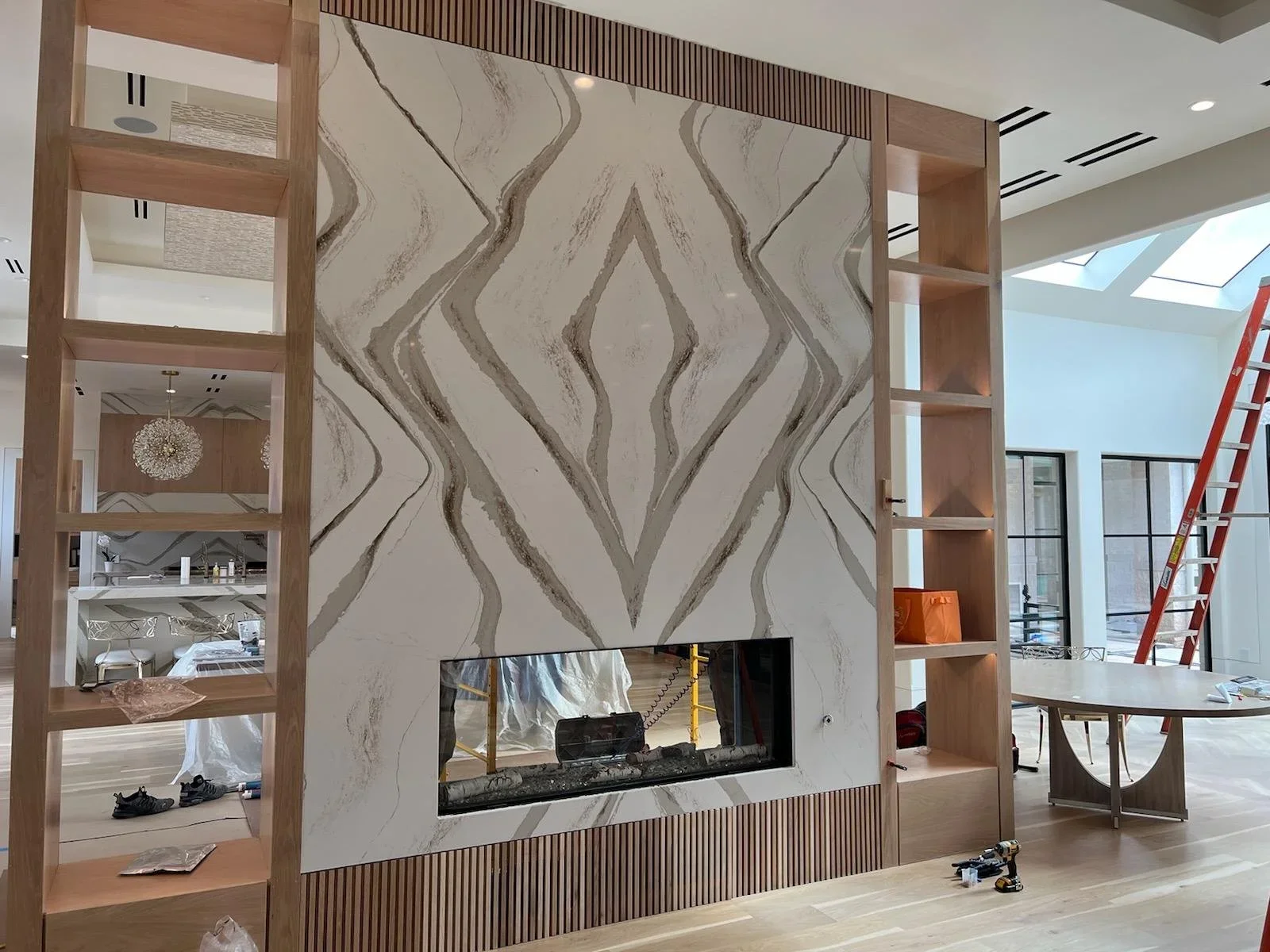 Bookmatched stone installation by TNT Countertops