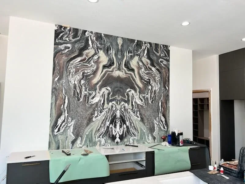 Bookmatched stone installation by TNT Countertops