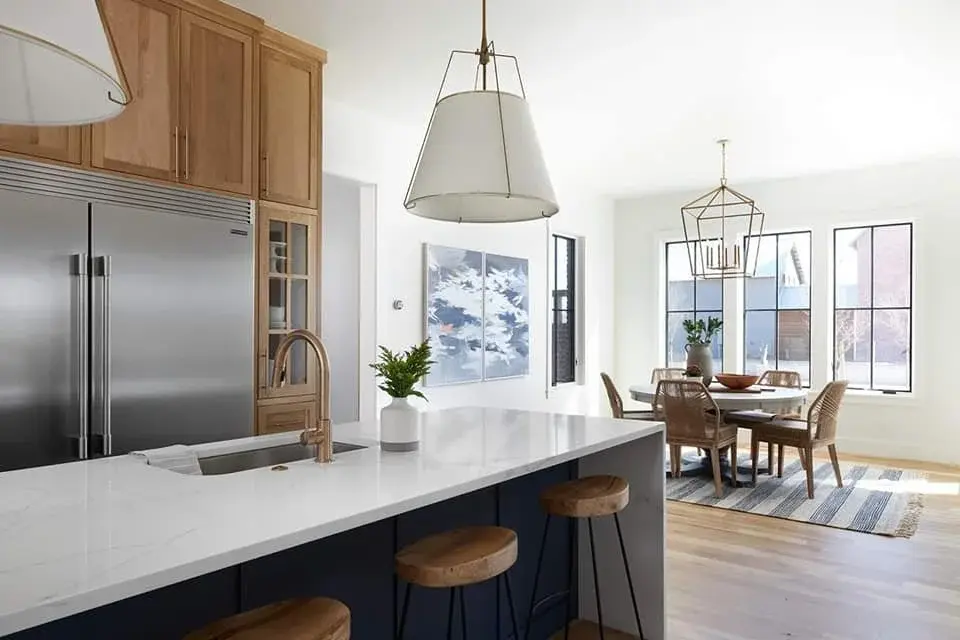 Luxury kitchen with custom stone countertops by TNT